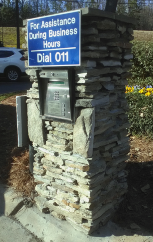 stone entry pillar for parking lot with keypad built in