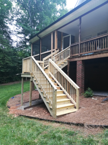 wooden staircase 90 degree turn second story deck
