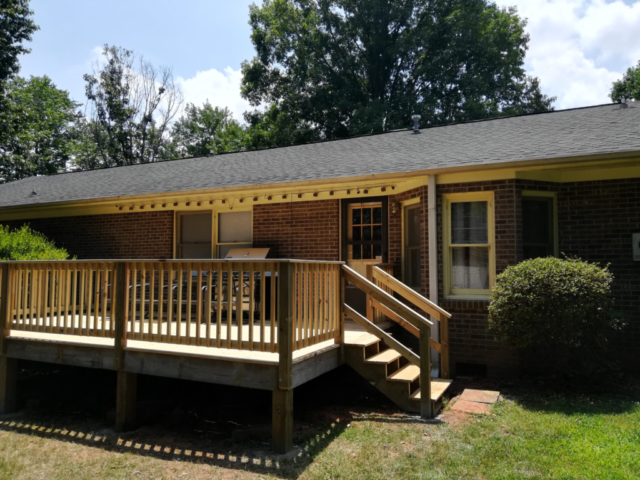 outside deck rear treated lumber before stain