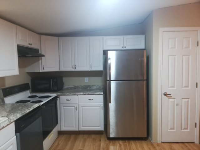 finished stock kitchen white cabinets and pantry